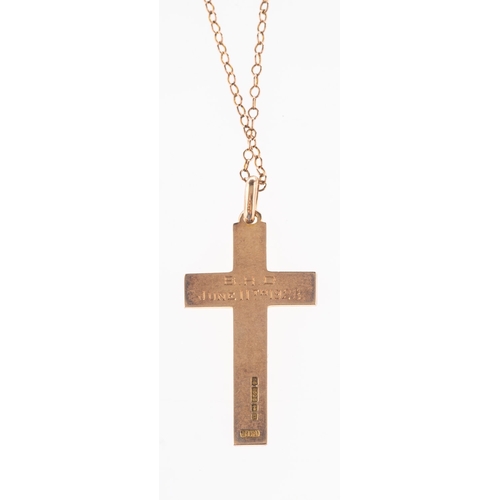 394 - A 15ct gold cross pendant with chain, a 15ct gold flat edged cross pendant with engraving to one sid... 