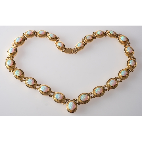 410 - An opal necklace and matching opal bracelet, the necklace set with twenty-three graduated oval opal ... 