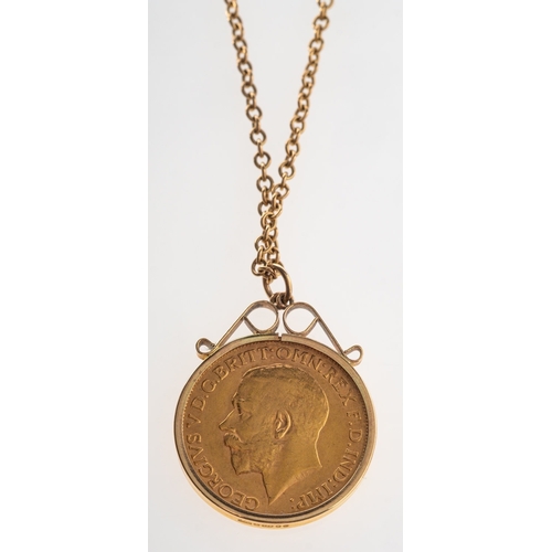 448 - A full sovereign in pendant mount with chain, a George V 1912 full sovereign in a 9ct gold pendant m... 