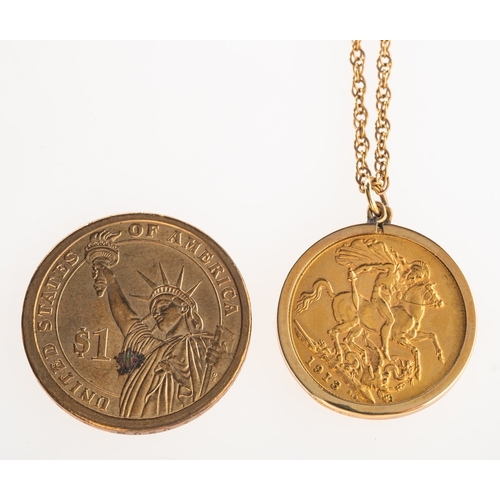 493 - A full sovereign in pendant mount with chain and one other coin, a 1913 George V full sovereign in a... 