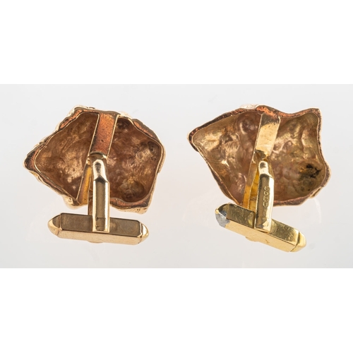 540 - Roy Cecil King. A pair of 1960's 18ct gold cufflinks, each face of a textured finish, post and toggl... 