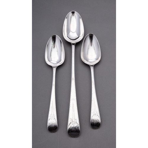 58 - A set of three George III Bright cut spoons by George Smith III, London 1779, Old English pattern, c... 