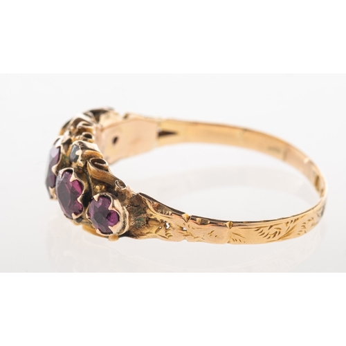 626 - A 15ct gold Victorian ring, set with five graduated circular-cut pink stones, interspaced by four sm... 