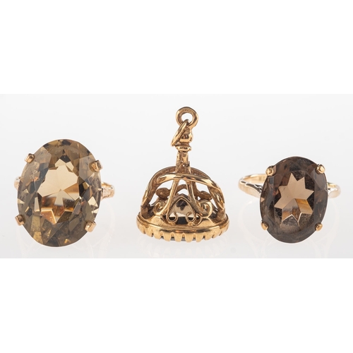 680 - A group of smokey quartz set jewellery, including a 9ct gold ring set with an oval-cut smokey quartz... 