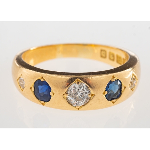 709 - A Victorian 18ct gold diamond and sapphire ring, set with three old-cut diamonds, interspaced by two... 