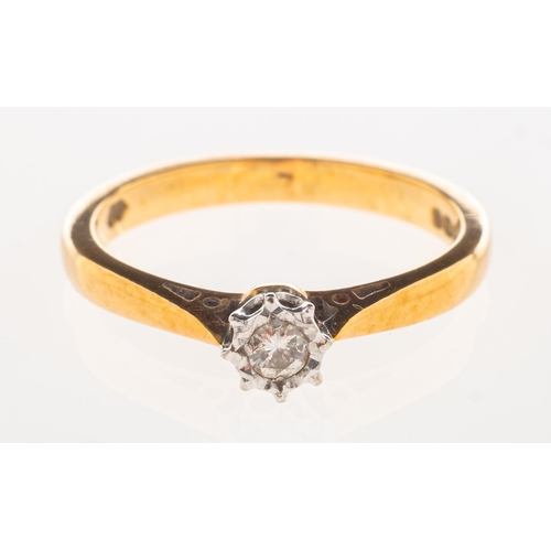 719 - An 18ct gold diamond solitaire ring, illusion set with a small brilliant-cut diamond, UK hallmark, s... 