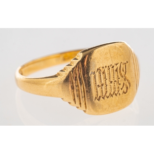 733 - An 18ct gold signet ring, monogrammed, UK hallmark, size O1/2, 4.4grams.