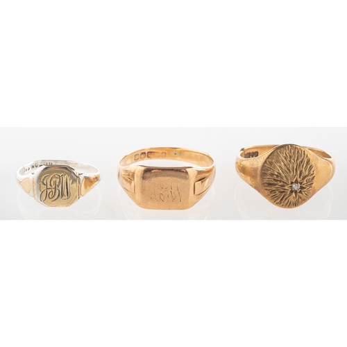 738 - A group of three signet rings, including a 9ct gold rectangular signet ring, faint UK hallmark, size... 