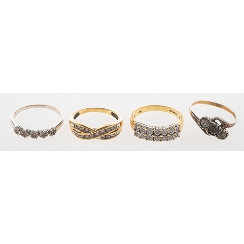 740 - A group of four rings, including a 9ct bi-colour double row ring, illusion set with brilliant-cut di... 