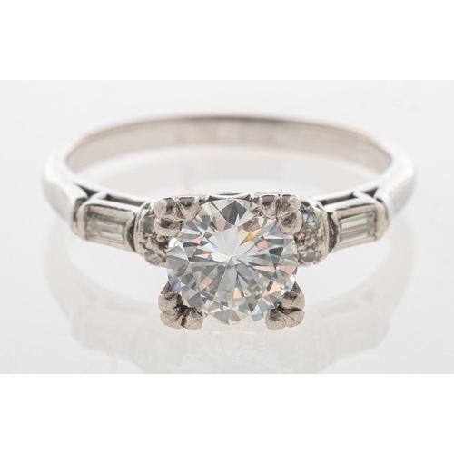 745 - An Art Deco style diamond ring, claw set to the centre with a brilliant-cut diamond in a square sett... 