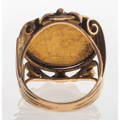 782 - A 1915 Austrian Ducat coin ring, an openwork ring set with a 1915 Austrian Ducat coin, shank indisti... 