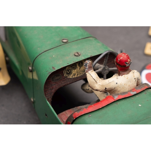 1036 - A Meccano Motor Car, in cream and green with red interior, painted driver figure  and white treaded ... 