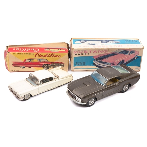 1043 - A Japanese tinplate friction drive 'Ford Mustang. Mach 1' grey with litho interior, in original box,... 