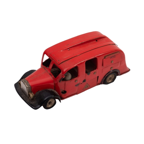 1044 - A Tri-ang Minic clockwork fire engine, red with black and silver trim, (incomplete)