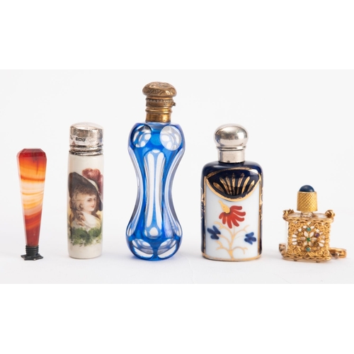 1083 - A collection of Victorian and later snuff bottles. Comprising a blue glass example and another with ... 