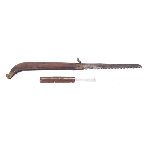 130 - An early 20th century folding saw, maker Whitby, 42xm long, together with a folding pocketknife/flea... 