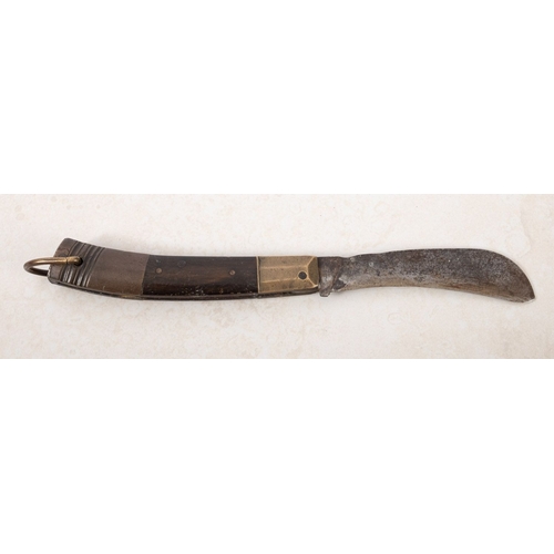 148 - An 18th century Pairing Knife. Having a horn and brass handle with a curved steel blade, complete wi... 