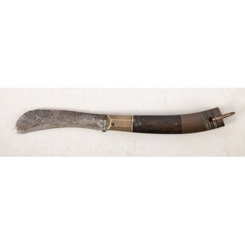 148 - An 18th century Pairing Knife. Having a horn and brass handle with a curved steel blade, complete wi... 