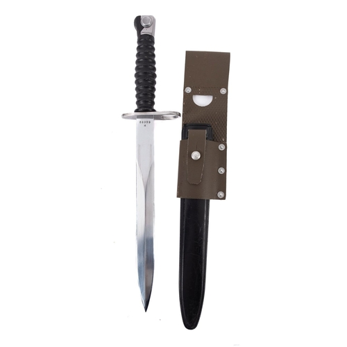 153 - A Swiss STG 57 Bayonet and Scabbard. Having a steel blade and plastic handle and scabbard, no. W6403... 