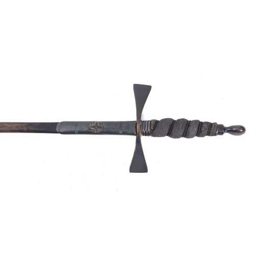 160 - A Masonic court sword. The straight metal blade with metal cross guard and fish skin handle, in a le... 