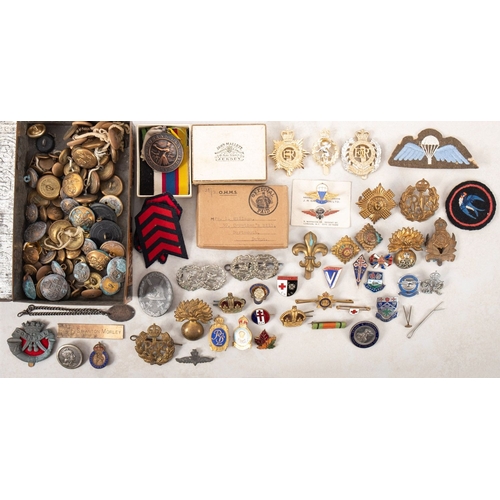 191 - A collection of mainly military related buttons and badges. Including RAF and Devonshire Regiment in... 