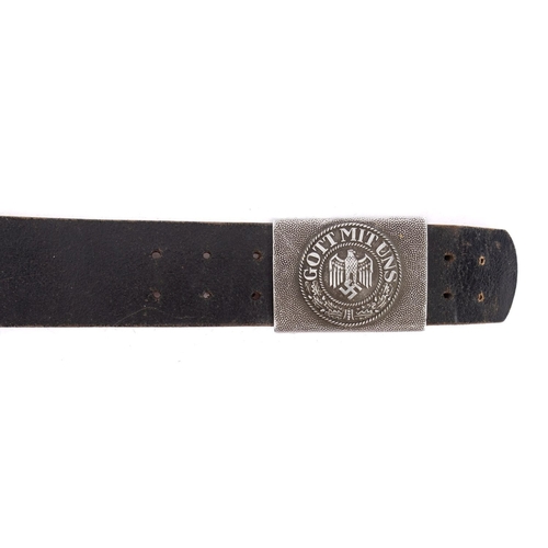 193 - A German army belt and three armbands. The black leather belt with silver stamped buckle, stamped 19... 