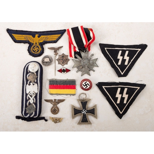 195 - A mixed collection of WWII and later German badges. Comprising cloth and metal examples noting a Ger... 