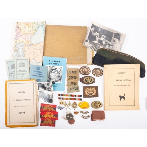 198 - A collection of paper ephemera and badges relating to Sgt Phillip  Waldren of the Devon Regiment. In... 