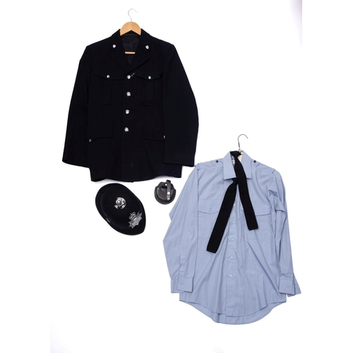 204 - A 1980s Leicestershire Constabulary Police uniform. Comprising jacket, shirt, helmet, tie and Metrop... 