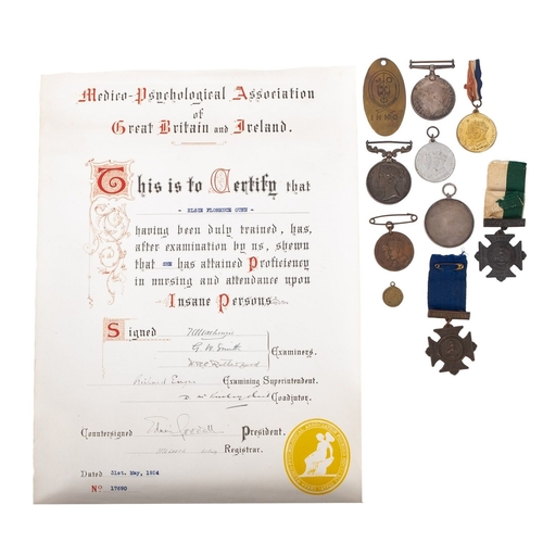 206 - A collection of various medals and badges. Comprising Queens South Africa, War Medal, plus two Medic... 