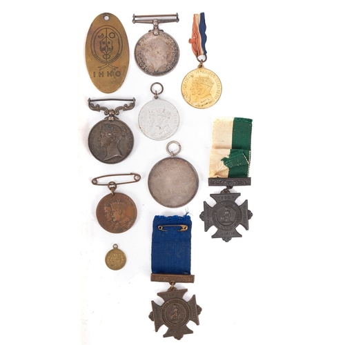 206 - A collection of various medals and badges. Comprising Queens South Africa, War Medal, plus two Medic... 