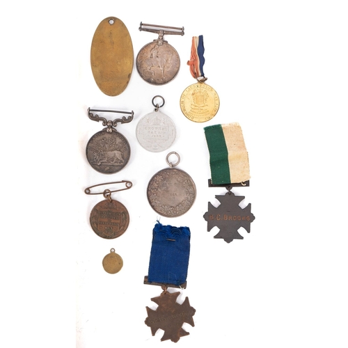 206 - A collection of various medals and badges. Comprising Queens South Africa, War Medal, plus two Medic... 