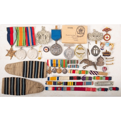 208 - A WWI, WWII and later collection of medals and badges. Comprising a WWI miniature group of four, WWI... 