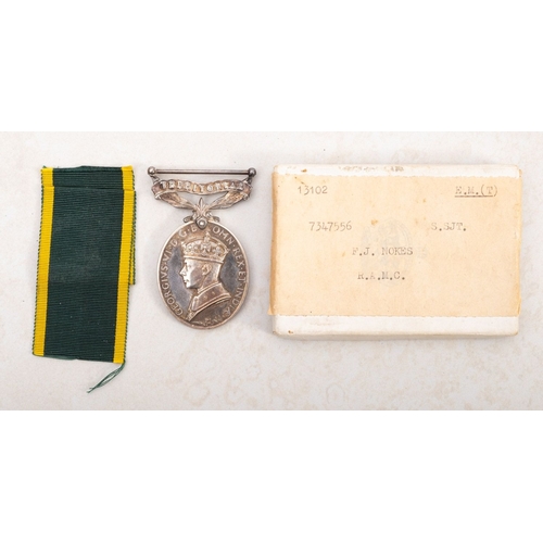 215 - A Territorial Efficiency medal awarded to S.SJT FJ Nokes RAMC 7347556. With ribbon, in original box.