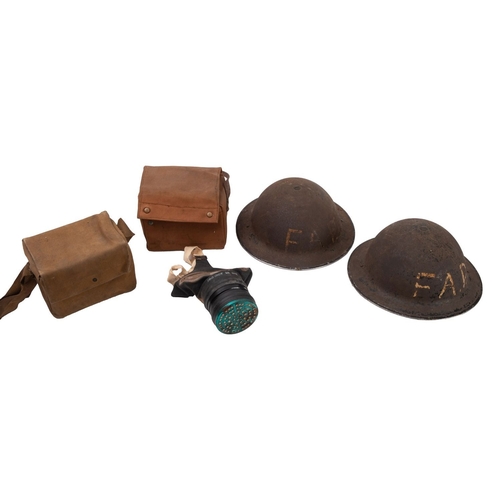 224 - Two WWII MK.I steel 'FAP' helmets, one dated 1940 the other 1941, both with original liners, togethe... 