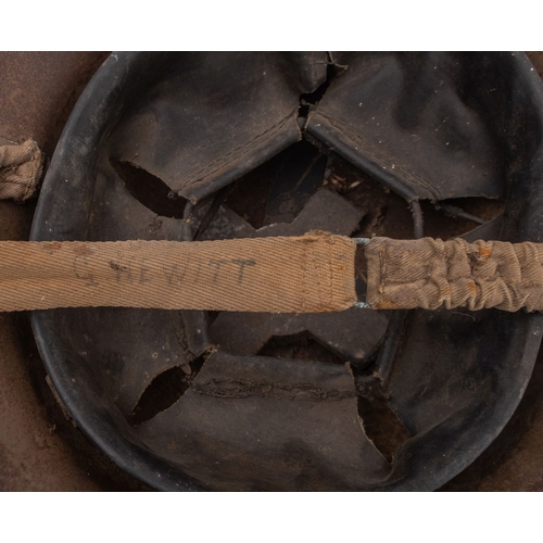 224 - Two WWII MK.I steel 'FAP' helmets, one dated 1940 the other 1941, both with original liners, togethe... 