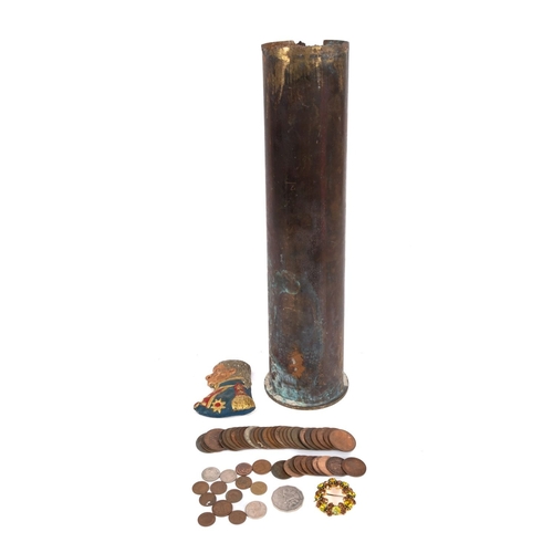 227 - A WWII 20pdr shell case, together with a collection of GB and foreign coins, a paste brooch and a re... 