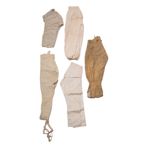 228 - A pair of late 18th/ early 19th century  white cotton uniform trousers , together with a pair of whi... 