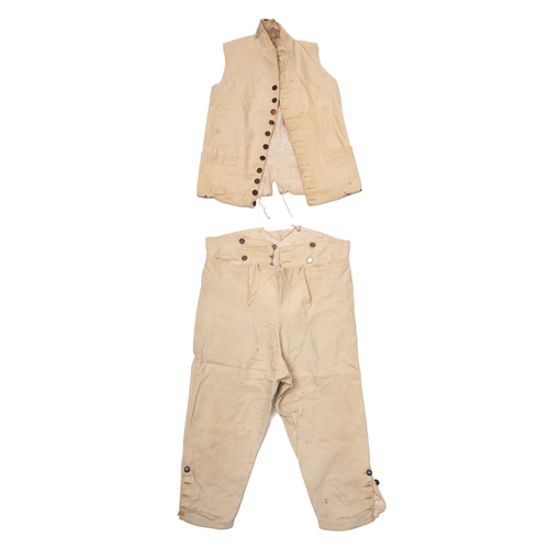 229 - South Devon Militia. A pair of late 18th century white wool breeches, with silvered 'SD' buttons, to... 