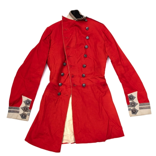 230 - South Devon Militia. A Victorian red wool double breasted tunic/overcoat, with silver trimmed white ... 