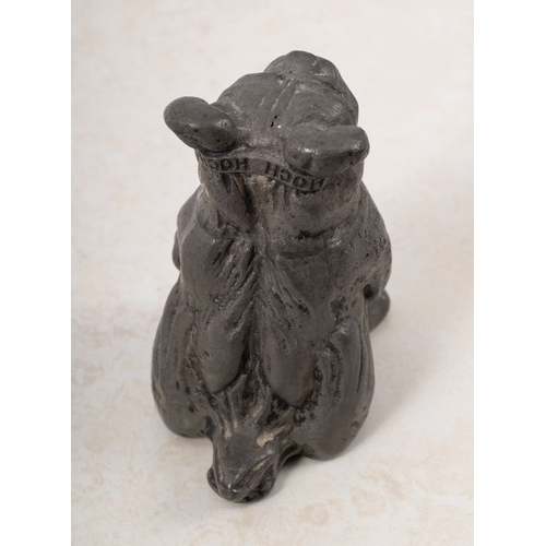 45 - An early 20th century John Hassal pewter propaganda Bulldog. Set in a seated position with ''How Wow... 