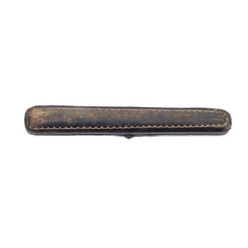 49 - A 9ct gold mounted cheroot holder, having a celluloid body, the end marked '9CT' and in box.