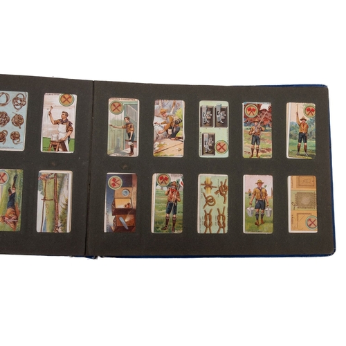 567 - A collection of sets and part sets of cigarette cards in a blue album. Including Gallaher Ltd Aeropl... 