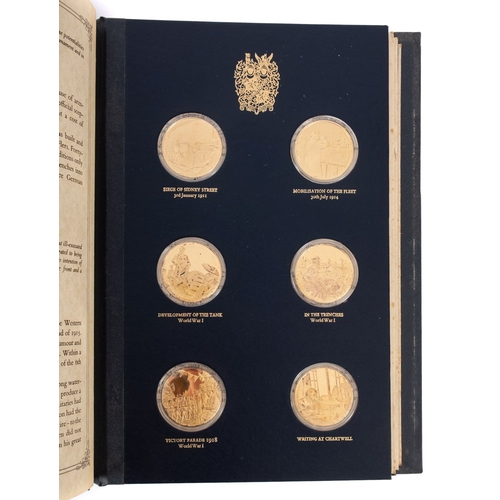 586 - An album of twenty-four silver gilt 'The Churchill Centenary Medals', makers J Pinches Ltd, limited ... 