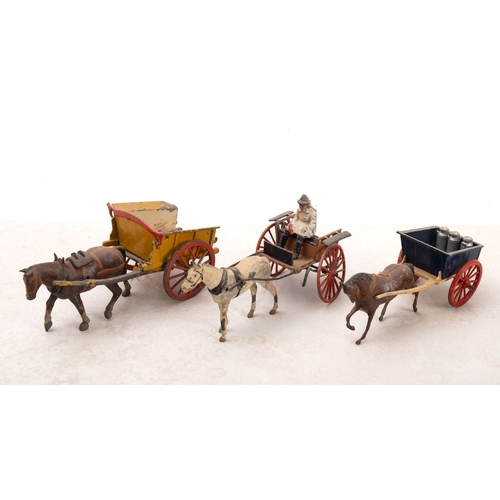 837 - A collection of four Britains diecast horse and cart sets. Comprising a four wheel flatbed cart, two... 