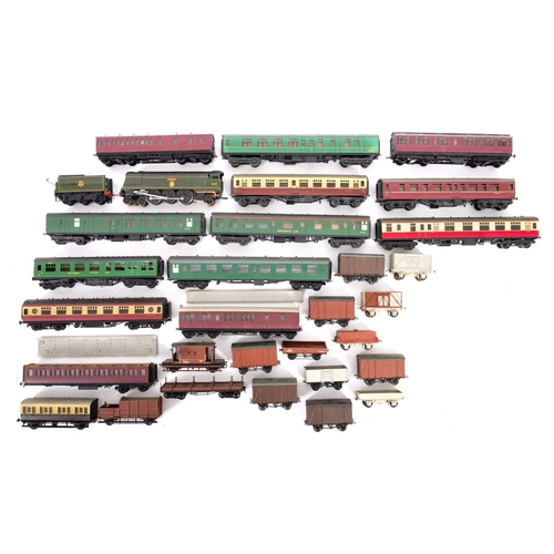 844 - A collection of OO/HO gauge rolling stock. Comprising a 4-6-2 BR Biggin Hill locomotive and tender n... 