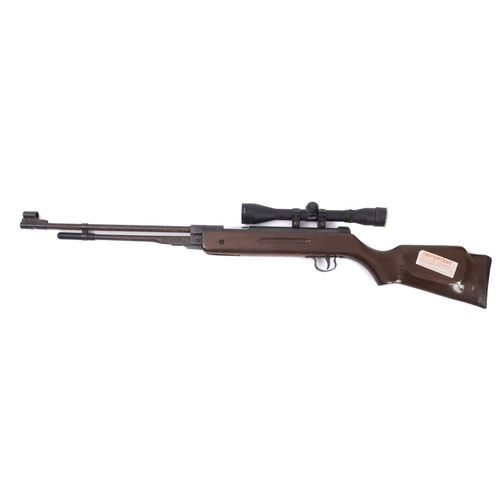 91 - A .22 calibre underlever air rifle. With wooden stock and 14'' length of pull, sold with a Richter O... 