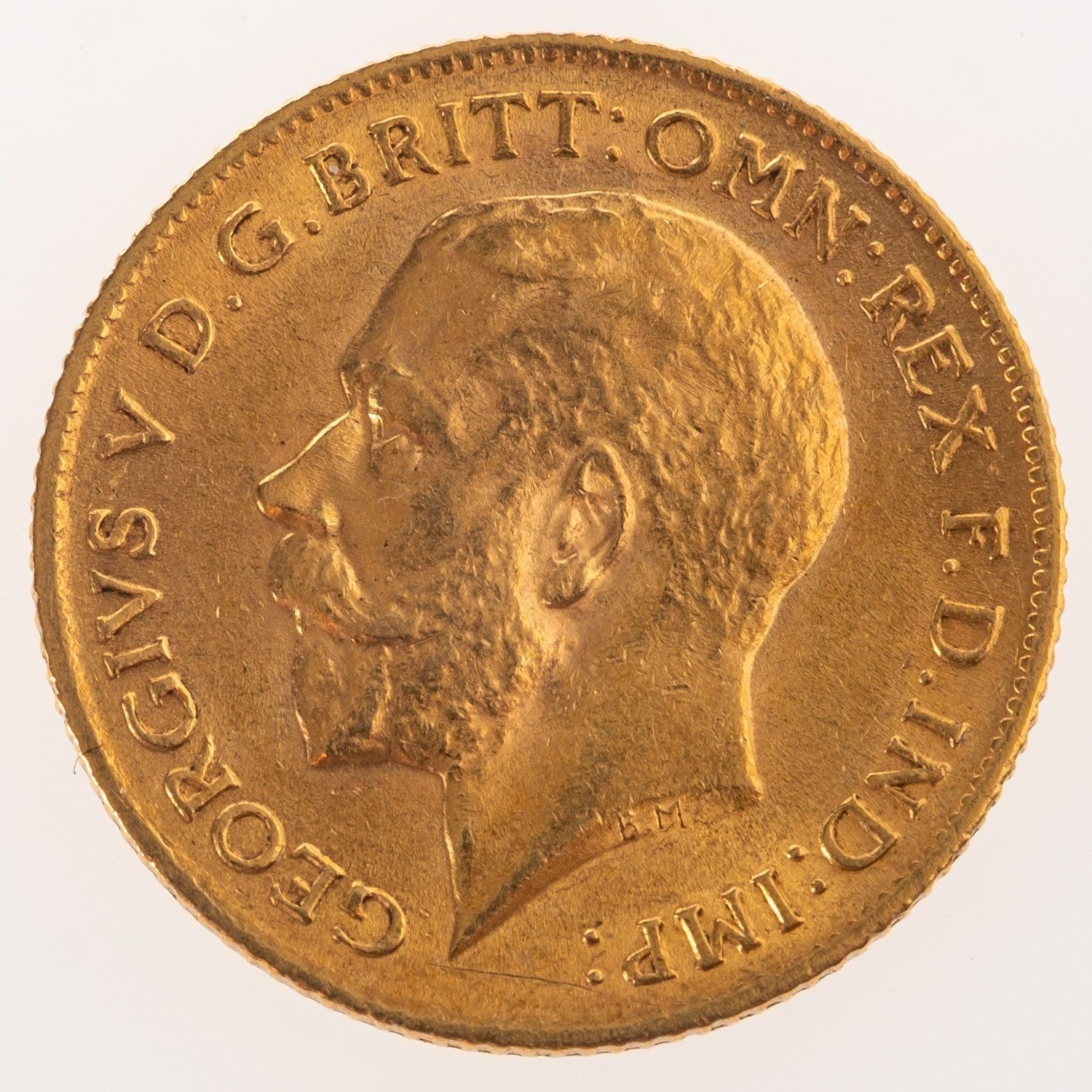 A George V Half Sovereign, bare bust, reverse. St George and the Dragon ...