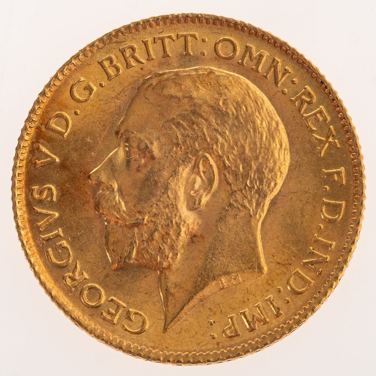 A George V Half Sovereign, bare bust, reverse. St George and the Dragon ...