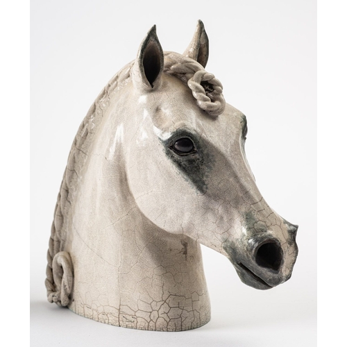 1 - Catriona McLeod [b 1946] a raku fired stoneware sculpture, of a horses head with plaited mane, 29.5c... 
